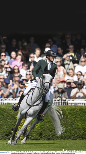  Michael Duffy of Ireland competes on Cinca 3 during the Longines FEI Jumping Nations Cup of Ireland international competition during the 2023 Longines FEI Dublin Horse Show at the RDS in Dublin. 