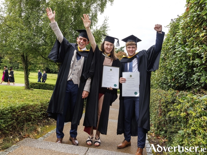 Avril King, Castlegar Co Galway (centre) pictured with fellow graduates Graham O'Sullivan, Bantry Co Cork, and Ruairi O'Sullivan, Rathcormac, Co Cork, at their conferral ceremony in UL this week. Photo: Arthur Ellis.