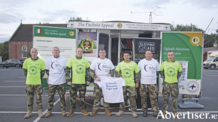 Seven Defence Forces participants marched through Athlone this week during a charity expedition from Dublin to Galway. Pictured, l-r, Peter McCardle, Fran Fitzhenry, Peter Scully, Martin Moules, Jonathan Santamaria, David Bates, and Darren McCarthy. 
