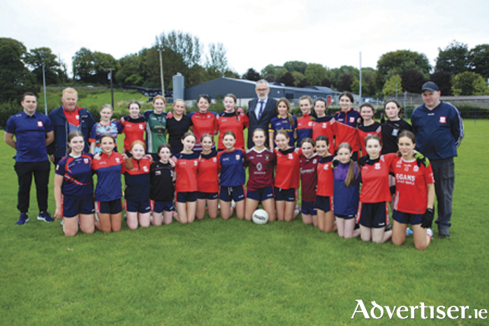 Larry McCarthy Uachtarán Chumann Lúthchleas Gael pictured on his recent visit to Caulry GAA club with the girls U14 panel and coaches Nestor Allen, Niall Shorthall and Ronan O’ Faoilain