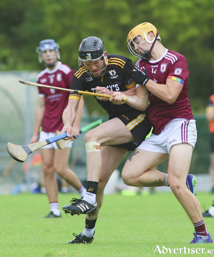 Killimor's Oisin McDonagh and Athenry's Jack Carr clash in action from the Brooks Senior B Hurling championship knockout game at New Inn on 
Sunday. The game ended with Athenry winning 2-28 to Killimor's 1-12. 
Photo: Mike Shaughnessy