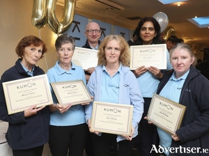 Award winning staff (front l-r) Maureen Devan, Margaret Kearns, Helen Flaherty and Julie Walshe. (Back ) Patrick Murphy and Garima Gupta at the Kumon Galway City West 10th Anniversary celebration and awards ceremony in the Menlo Park Hotel on Sunday. Photo: Mike Shaughnessy 