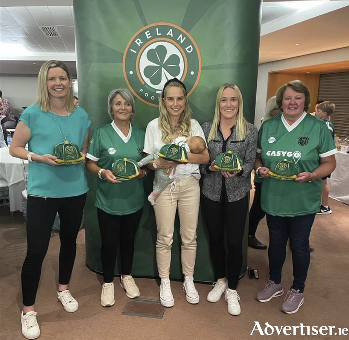 The Galway girls who have played for the Republic of Ireland at senior international level and who received their 50th anniversary commemorative caps from the FAI last weekend at the Aviva Stadium - Susie Cunningham, Nono McHugh, Julie-Ann Russell (with baby Rosie), Méabh De Búrca and Sally Bowens. 
