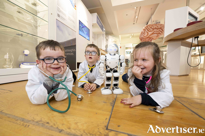 At the exhibit at the Galway City Museum 'Superhuman' developed by CÚRAM were Dáithi and Cian Muldoon aged 4 and 6 from Turloughmore and Chloe Sheeran, 4 from Monivea with Alpha the robot from ATU enjoying the programme launch of the 2023 Galway Science and Technology Festival which runs from the 12th to the 24th of November 12-24. For details see GalwayScience.ie.
Photo: Andrew Downes, xposure