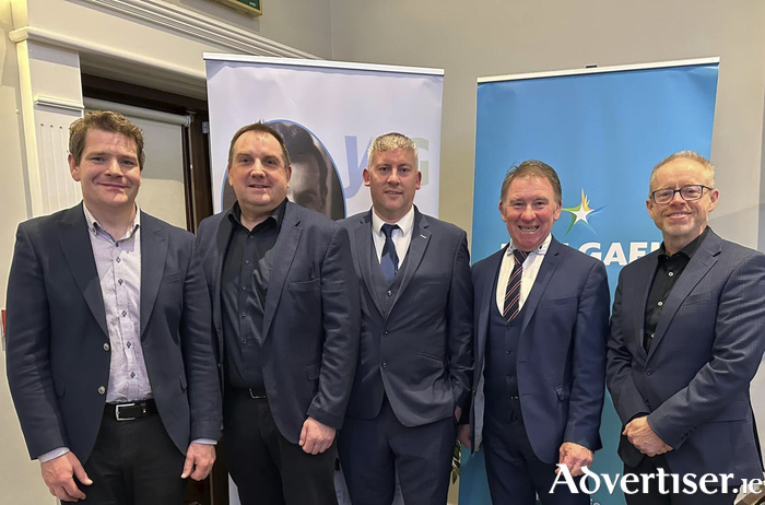Pictured right; Mnister Peter Burke with candidates Ollie Turner, 
Cllr Andrew Reddington, Cllr Pete Roche and Deputy Ciaran Cannon.