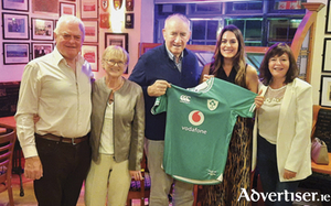 Leo Galvin is presented with a customised Ireland jersey by his god-daughter Ali Henshaw.  Also pictured are Tony Henshaw, Assumpta Galvin and Audrey Henshaw
