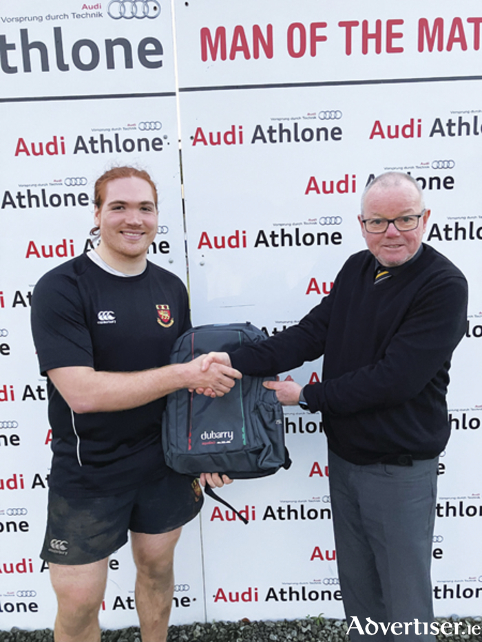 Cathal Walsh is presented with the AUDI Athlone 'Man of the Match' award by Buccaneers president Brendan Wilkins following the weekend loss to Garryowen