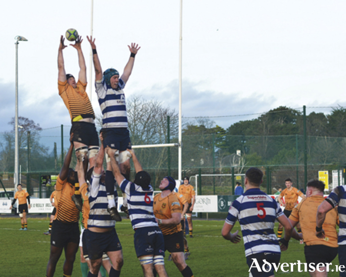Daniel Qualter rises highest to claim prime lineout possession during Buccaneers defeat of Blackrock College in the AIL this past weekend