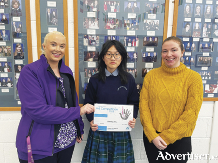 Pictured, l-r, Athlone & Castlerea Credit Union Marketing Executive Claire Mulvihill, Jiamin Wu, Our Lady's Bower 14-17 years category winner and Our Lady's Bower art teacher, Brid Cuddy