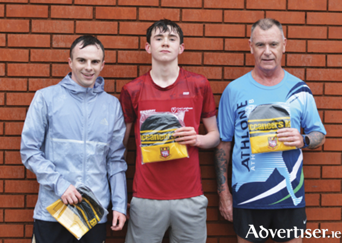 Pictured are those who placed as they crossed the line at the conclusion of the Buccaneers New Year’s Day fun run, l-r, Ross Mulvihill (third), Sean Purcell (first) and Eddie Lynch (second).