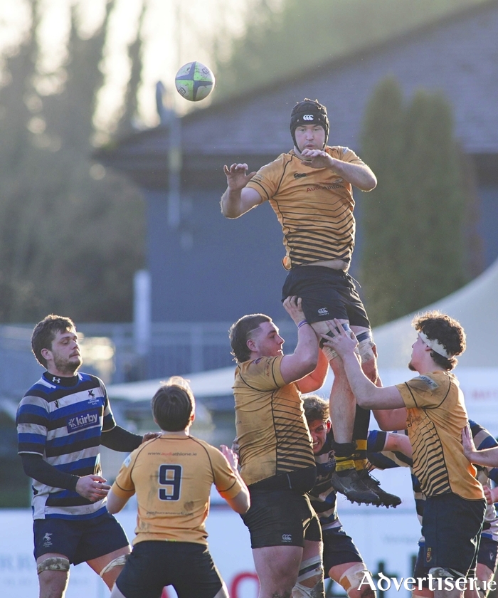 Buccaneer's Fionn McDonnell delivers a lineout ball to Leo McFarland in action from the Bank of Ireland Connacht Senior Cup semi-final at Dubarry Park, Athlone on Saturday. Buccaneers booked their place in the cup final with a 27 –15 win over Corinthians. Photo: Mike Shaughnessy 