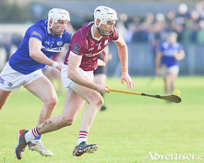 Galway’s Jason Flynn and Gearoid Lynch, Laois in action from the 
Dioralyte Walsh Cup game at Duggan Park on Sunday. 
Photo: Mike Shaughnessy 