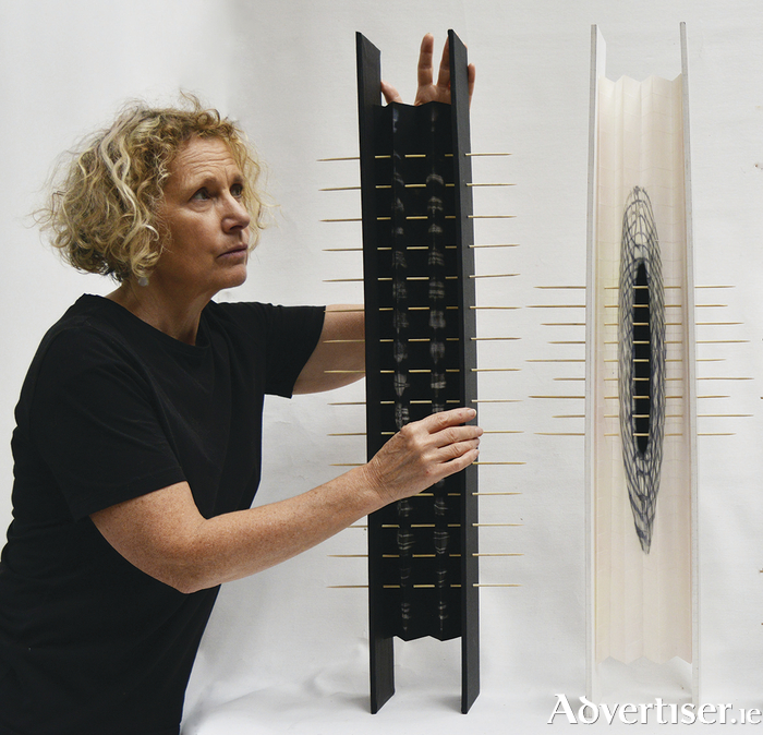 Artist Siobhan Percy making 'Books'