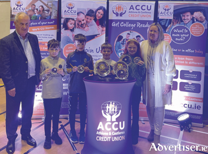 Pictured are pupils from Carrick NS, Ballinlough, Castlerea, County Roscommon - Cathal Duggan, Sean Scally, Mollie Marham and James McCartin, who were runners-up in Category A at the recently hosted Athlone & Castlerea Credit Union Quiz.  The pupils are pictured with Michael Evans, CEO, ACCU and Emma Sammon, Chairperson, ACCU Board.
