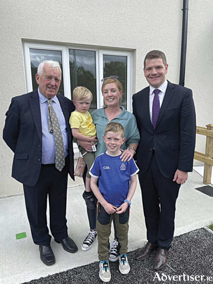 Pictured in July 2023 when new Moate houses were officially opened were, l-r, Cllr Tom Farrell, Sandra Meacle with her sons Padraig and Cian and Minister Peter Burke