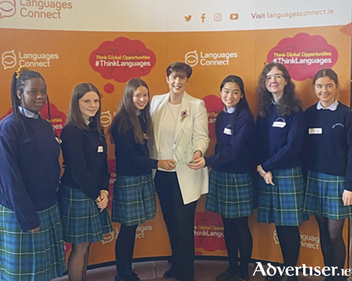 Winners of the #ThinkLanguages Champion Team Final, students of Our Lady’s Bower, Athlone, are pictured being presented their award by Minister for Education, Deputy Norma Foley, at the Department of Education.  Left to right, Teresa Detoche, Hannah Murray, Ella Scullion, Minister for Education, Deputy Norma Foley, Cindy Zhang, Eilish Brehany and Mia Daly