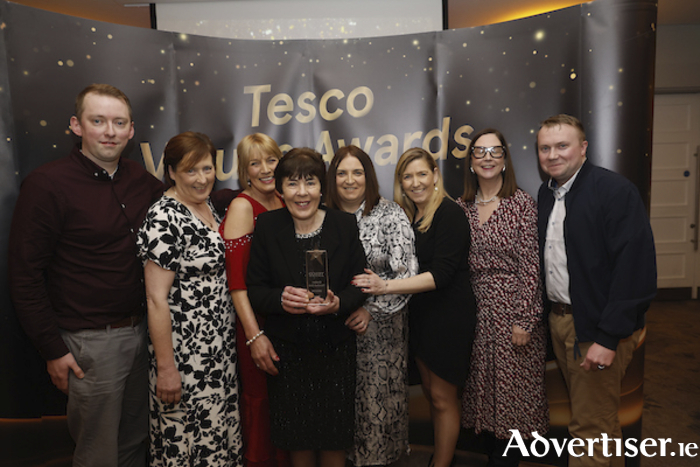 Pictured receiving the Tesco Business Impact Award the Tesco Indreabhán team and Tesco Ireland Legal Director Sarah Gallagher.