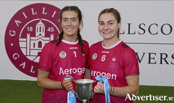 University of Galway co-captains Fiona Ryan and Tiffanie Fitzgerald with the Purcell Cup after they defeated SETU Carlow in the Electric Ireland Purcell Cup Final at the University of Galway Connacht GAA Air Dome on Sunday. Photo: Mike Shaughnessy 