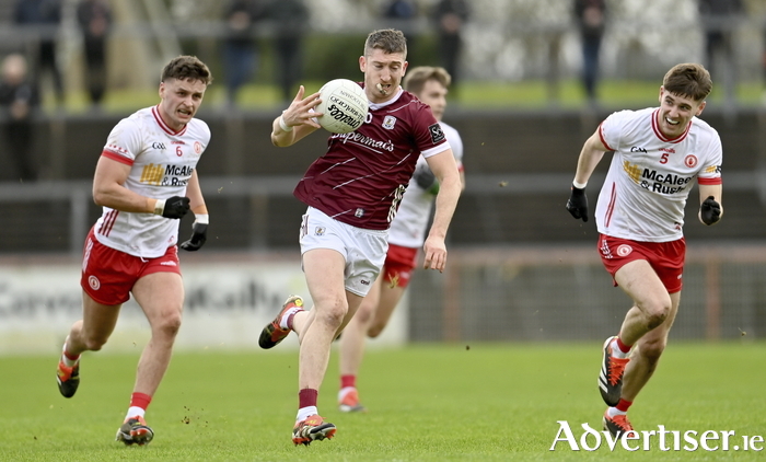 Johnny Heaney of Galway in action against Michael McKernan, left, and Niall Devlin of Tyrone during the Allianz Football League Division 1 match between Tyrone and Galway at O'Neills Healy Park in Omagh, Tyrone. Photo by Ramsey Cardy/Sportsfile