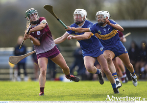 Niamh Mc Peake of Galway is tackled by Mairead Eviston, left, and Clodagh McIntyre of Tipperary during the Very Camogie League Division 1 match between Tipperary and Galway at The Ragg GAA Grounds in Tipperary. Photo by Tom Beary/Sportsfile