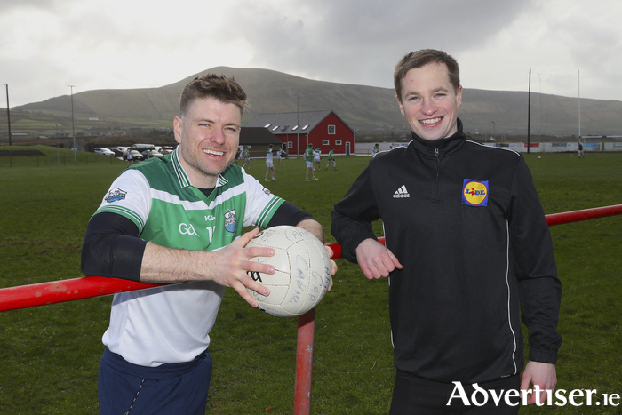 Johnny B O'Brien of The Johnnies comedy duo having a chat with Comórtas chairman Pádraig Ó Sé in Gallarus before his team Cahir of Tipperary competed in the junior men's cup at the Lidl Comórtas Peile Páidí Ó Sé football tournament which took place in West Kerry at the weekend.