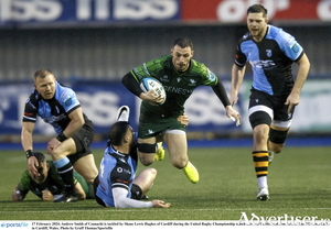 Andrew Smith of Connacht is tackled by Shane Lewis Hughes of Cardiff during the United Rugby Championship match between Cardiff and Connacht at Cardiff Arms Park in Cardiff, Wales. Photo by Gruff Thomas/Sportsfile