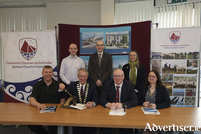 Pictured at the construction contract signing for Caisleín Raithín, Ardrahan, Back Row: Jason Lavelle (Executive Engineer, GCC), Michael Owens (Director of Services, GCC), Cuala McGann (OBFA Architects), Front Row: Donal McInerney (Jada Developments Ltd.), Cllr Liam Carroll (Cathaoirleach GCC), Liam Conneally (Chief Executive, GCC) and Eithne Murphy (Senior Executive Engineer, GCC). Photo Mike Shaughnessy. 