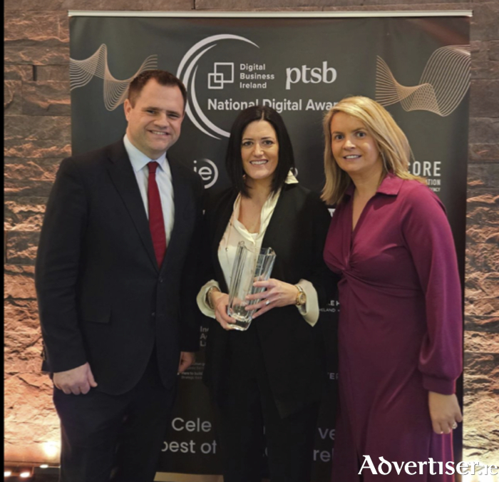 Aoife Noone pictured receiving her award from Minister Neale Richmond and Cllr Clodagh Higgins at the National Digital Awards ceremony.