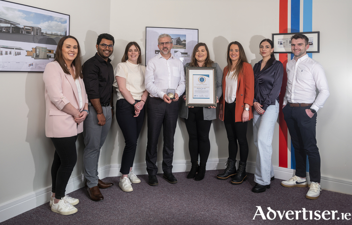 The PHE Team receiving their accreditation.