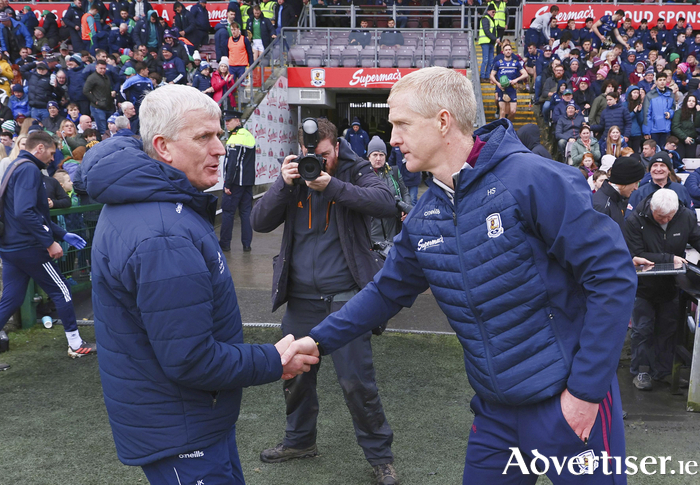 Limerick manager John Kiely and Galway manager Henry Shefflin congratulate each other after the Allianz National Hurling League game at Pearse Stadium on Saturday. Photo: Mike Shaughnessy 