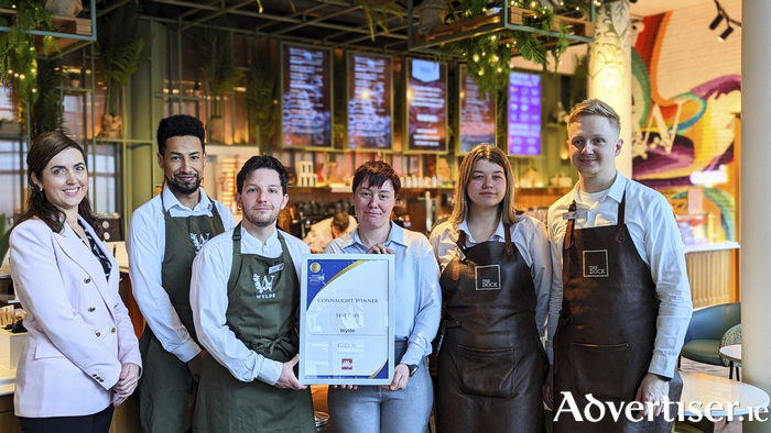 WYLDE Cafe Manager Ivona Catak (centre) and HYDE manager Roisin McGee (left) with their team.  