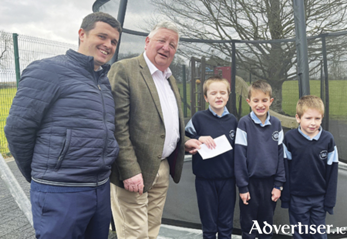 Cllr Laurence Fallon is pictured with Mark Craven, principal, and pupils of the Sunflower Rooms at St Mary’s NS, Knockcroghery. 
Cllr Fallon will run a poster free campaign for this year’s local elections and instead has donated what it would cost to produce and erect posters to the Sunflower Rooms.