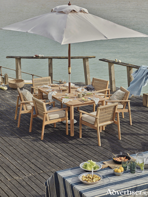 Neptune&rsquo;s Kew dining set was designed with relaxed al fresco dining in mind. Its angled silhouettes and handwoven seats draw upon Mid Century design, while the use of solid teak ensures lasting durability. Each chair comes paired with textured weather-resistant cushions for comfort, too. Neptune&rsquo;s Kew 6 Seater Dining Set with Kew Carver Chairs,  priced at &euro;7,615. See Neptune.com for Irish stockists.