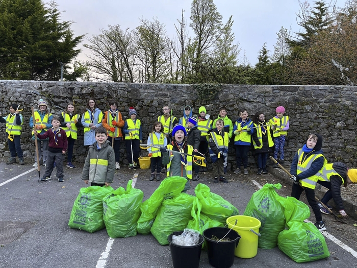 The scouts cleaning up the car park on Main St, Loughrea. 
