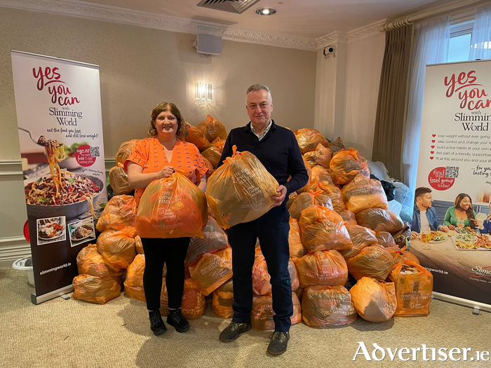 Slimming World consultant Maura with Paul Hughes of the Irish Cancer Society.