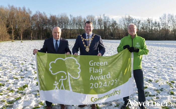 (L to R) Patrick Greene, Director of Services, Galway City Council, Mayor of the City of Galway, Cllr Peter Keane and Brendan Smith, Tuatha of Terryland Forest Park holding the Green Flag 2024 for Terryland Forest Park 
