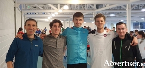 Craughwell AC middle distance medal winners with coach Mark Davis on left, then Oisin Davis, Jack Mislkella, Kyle Moorhead and William Fitzgerald.