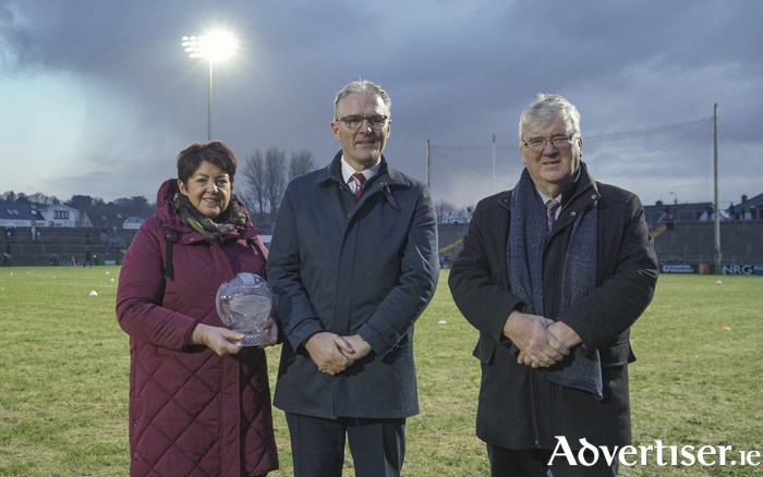Una and Pat McDonagh pictured with GAA president Jarlath Burns at Pearse Stadium on Saturday evening.