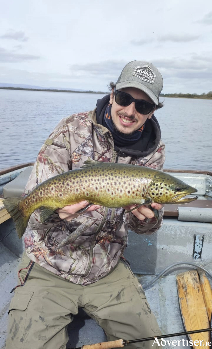Quentin Bertrand with a fresh trout on Lough Corrib