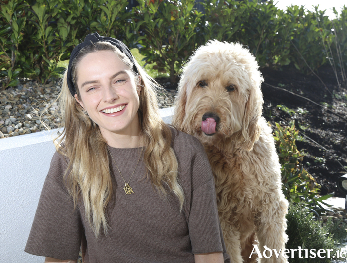 Julie-Anne pictured at home with her dog Harvey. Photo: Mike Shaughnessy