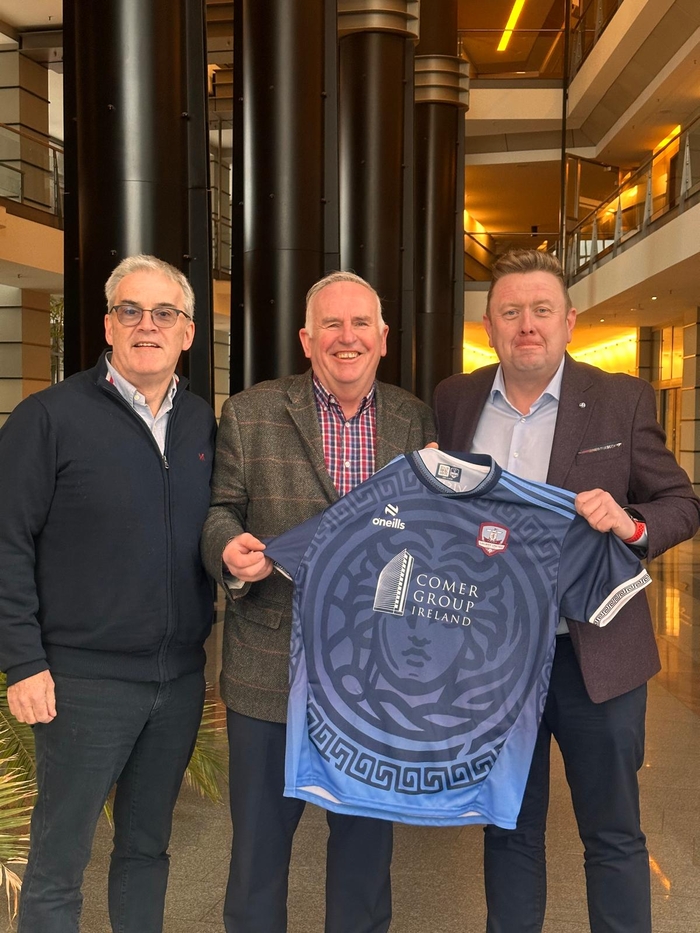  Galway United's John Flannery and Jonathan Corbett flank Luke Comer in Berlin as he confirmed his commitment to the club and its ideals.