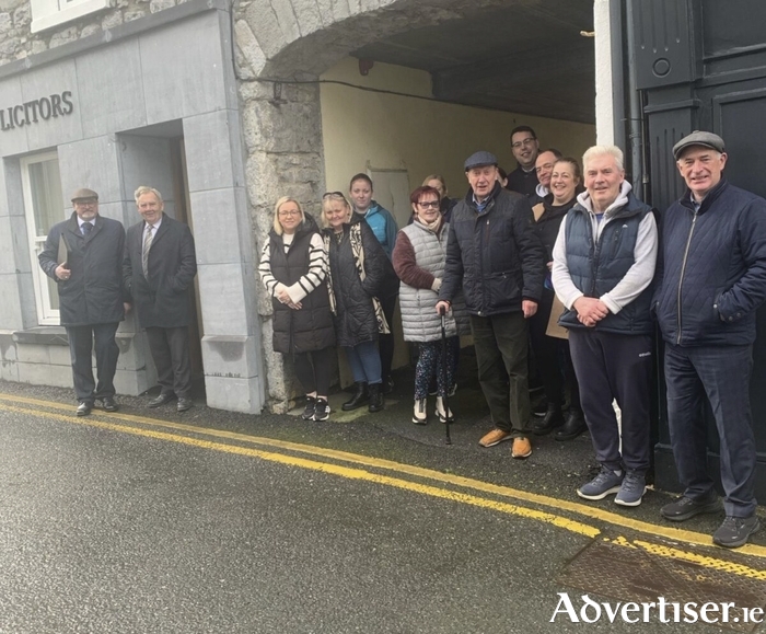 Cllr Declan Kelly with residents and business owners on Abbey Street, Loughrea 