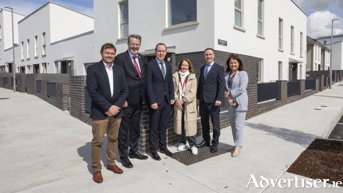 Visiting Garraí Beag are (L-R) Micheál Cormican, Senior Engineer; Cllr Níall McNeils; John Cummins TD; Sinéad Johnstone, Senior Executive Engineer;  Leonard Cleary, CEO; and Elizabeth Fanning, Director of Social Development Directorate. (Photo: Cormac Mac Mahon)