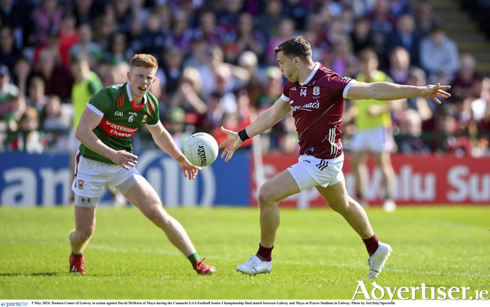 Damien Comer of Galway in action against David McBrien of Mayo during the Connacht GAA Football Senior Championship final match between Galway and Mayo at Pearse Stadium in Galway. Photo by Seb Daly/Sportsfile