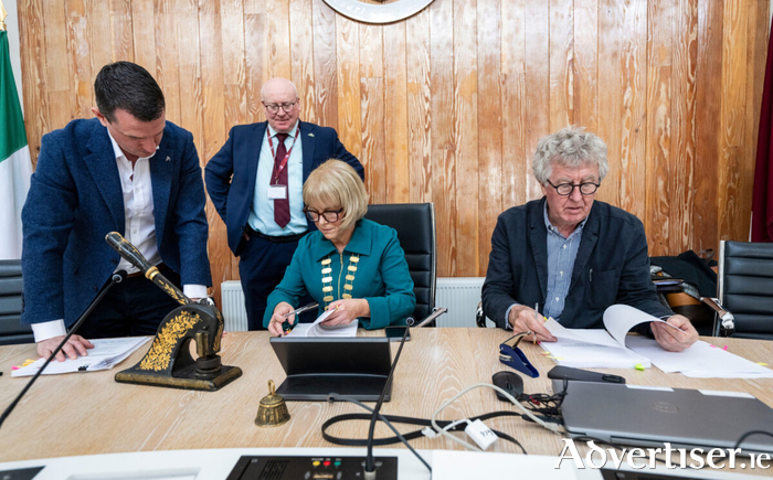 Pictured at Áras an Chontae for the contract signing for the design of affordable housing schemes in Athenry, County Galway (left to right) James Farrell, Executive Engineer, Galway County Council; Liam Conneally, Chief Executive, Galway County Council; Cllr Martina Kinane, Cathaoirleach of the County of Galway; and Paul Keogh, Studio PKA (Paul Keogh Architects). Credit: Andrew Downes, Xposure