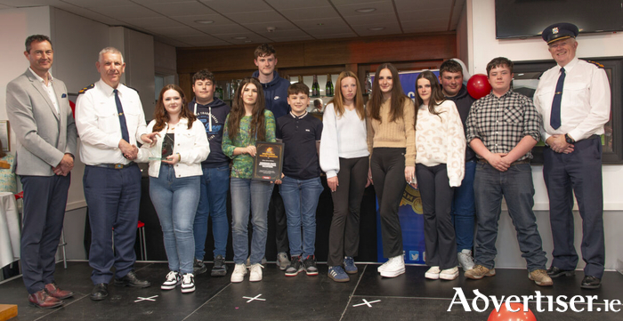 At the Galway Garda Division’s 5th Annual Youth Awards were: Group Winners Connemara Youth Intergenerational Volunteers with George Osborne, Regional Manager, SuperValu (sponsors), Superintendent Finbarr Philpott, Galway County West Community Engagement, and Chief Superintendent Gerry Roche.