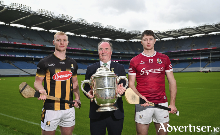 Comhairle Laighean Derek Kent, centre, with Adrian Mullen of Kilkenny, left, and Cathal Mannon of Galway during a Leinster GAA Senior Hurling Championship Final preview media event at Croke Park in Dublin. 