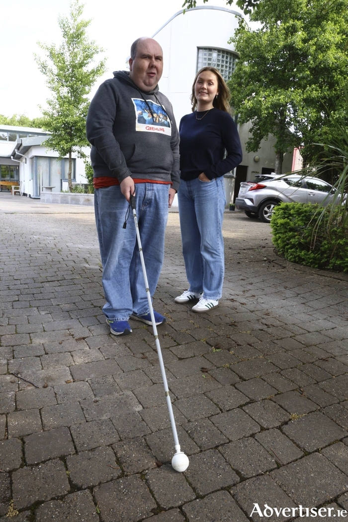 Joseph Faulkner who will undertake a 5 km walk around Galway with Georgia Megahey of Ability West. Photo: Mike Shaughnessy