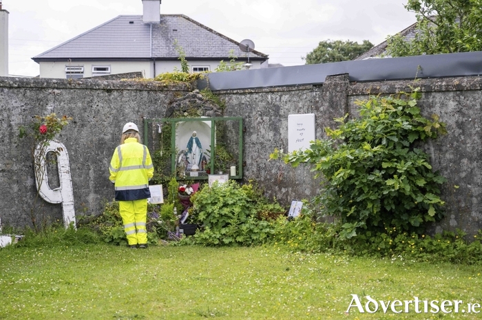A worker visits the grotto at the site of the former Mother and Baby institution ahead of preparation works, which began this morning. Photo: Andrew Downes/ XPosure.