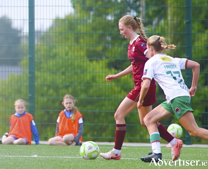 Galway United’s Emily Fitzgerald and Cork City’s Zoe Finnerty in action from the All-Island Cup group stage match at Moyne Villa, Headford. (Photo: Mike Shaughnessy)